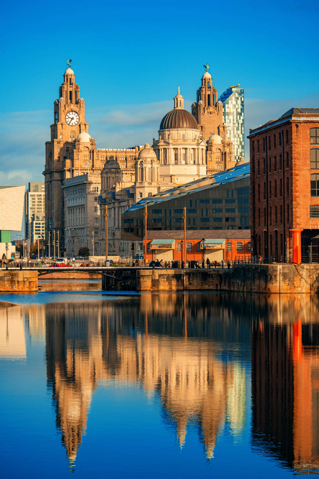 Liverpool waterfront skyline with the Royal Liver Building reflected in the docks