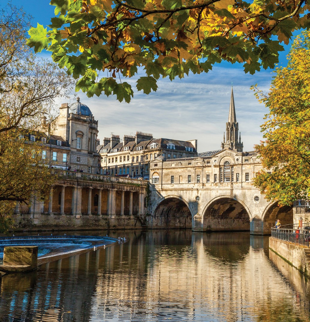 Pulteney Bridge spanning the River Avon in Bath with Georgian buildings and a weir