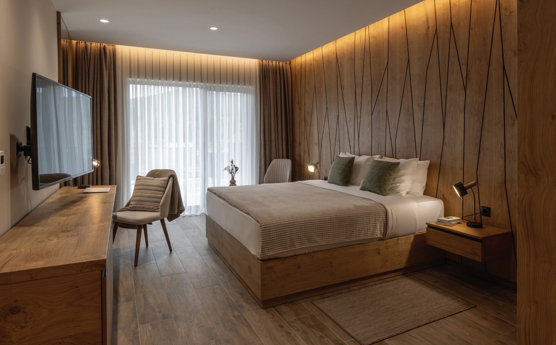 Contemporary Bristol hotel room with warm timber finishes